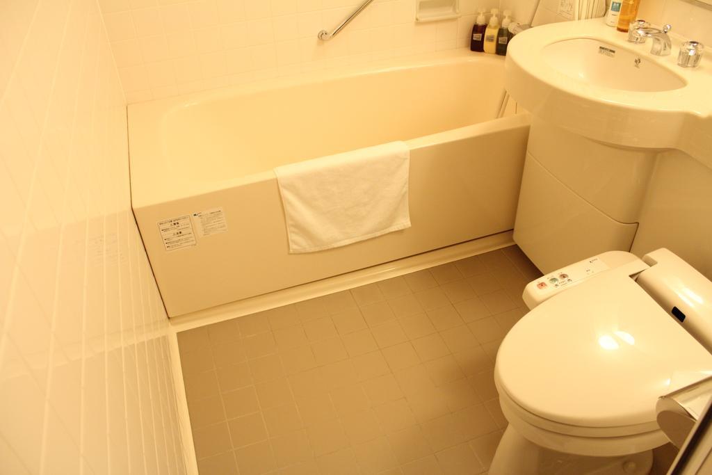 Hotel Saika Fudžisawa Pokoj fotografie