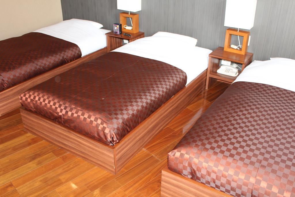 Hotel Saika Fudžisawa Pokoj fotografie