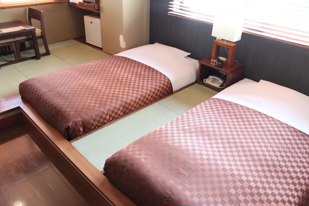 Hotel Saika Fudžisawa Pokoj fotografie